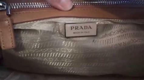 prada clutch bag replica|is my prada bag real.